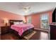 Bedroom featuring hardwood floors, neutral paint and plenty of natural light at 308 Paper Woods Dr, Lawrenceville, GA 30046