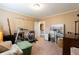 Bedroom with space for a desk, chair and an exercise equipment to be used as an office at 7024 Evergreen Way, Buford, GA 30518