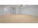 Large basement with neutral colored carpet and recessed lights at 500 Meadowmeade Ln, Lawrenceville, GA 30043