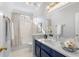 Bathroom features an extended quartz countertop and framed mirror at 500 Meadowmeade Ln, Lawrenceville, GA 30043