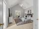 Spacious bedroom featuring high ceilings, a ceiling fan, and a large window with plantation shutters at 500 Meadowmeade Ln, Lawrenceville, GA 30043