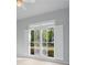 Bedroom windows are dressed with white shutters at 500 Meadowmeade Ln, Lawrenceville, GA 30043