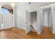Bright foyer with high ceilings, chandelier, and staircase access at 500 Meadowmeade Ln, Lawrenceville, GA 30043