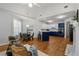 Open concept kitchen, with hardwood floors, breakfast area, fireplace, and modern finishes at 500 Meadowmeade Ln, Lawrenceville, GA 30043