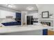 This modern kitchen features stainless steel appliances, quartz countertops and sleek finishes at 500 Meadowmeade Ln, Lawrenceville, GA 30043