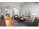 Spacious living room with hardwood floors, elegant decor, and fireplace at 500 Meadowmeade Ln, Lawrenceville, GA 30043