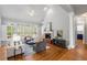 Spacious living room with vaulted ceilings, a fireplace, and large windows at 500 Meadowmeade Ln, Lawrenceville, GA 30043
