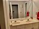 Spacious bathroom with double sink vanity, large mirror, and ample counter space at 6972 Sandtown Ln, Stone Mountain, GA 30087