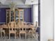 Elegant dining room featuring a chandelier, hutch, and table with chairs at 6972 Sandtown Ln, Stone Mountain, GA 30087