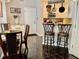 Practical kitchenette bar seating, and dining set at 6972 Sandtown Ln, Stone Mountain, GA 30087