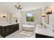 Bright bathroom features a soaking tub, dual vanities, and modern fixtures at 1068 Moores Mill Nw Rd, Atlanta, GA 30327
