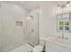 Bathroom with a glass-enclosed shower and modern fixtures at 1068 Moores Mill Nw Rd, Atlanta, GA 30327