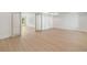 Open bonus room with hardwood floors, white walls and trim, and abundant natural light at 1068 Moores Mill Nw Rd, Atlanta, GA 30327