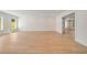 Large living room with beautiful hardwood floors, white walls and trim, and abundant natural light at 1068 Moores Mill Nw Rd, Atlanta, GA 30327