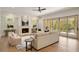 Inviting living room featuring a fireplace, modern furniture, and access to an outdoor space at 1068 Moores Mill Nw Rd, Atlanta, GA 30327