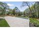 Backyard view of a modern pool surrounded by trees at 1068 Moores Mill Nw Rd, Atlanta, GA 30327