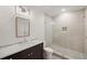 Modern bathroom with marble countertop and walk-in shower at 1074 Moores Mill Nw Rd, Atlanta, GA 30327