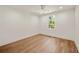 Bedroom featuring hardwood floors and a window with natural light at 1074 Moores Mill Nw Rd, Atlanta, GA 30327