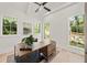 Office space with wood flooring, multiple windows and a desk with backyard view at 1074 Moores Mill Nw Rd, Atlanta, GA 30327