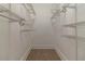 Walk in closet with ample shelving space at 1124 Lawton Sw Pl, Atlanta, GA 30310
