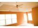 Bright bedroom featuring large windows and a ceiling fan at 1972 Ashwood Grove Dr, Snellville, GA 30078