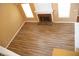 Open-concept living room featuring fireplace and hardwood flooring at 1972 Ashwood Grove Dr, Snellville, GA 30078