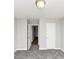 Carpeted bedroom with two doorways at 222 Alton Cir, Villa Rica, GA 30180
