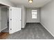 Carpeted bedroom with a window at 222 Alton Cir, Villa Rica, GA 30180