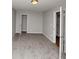 Carpeted bedroom with two doorways at 222 Alton Cir, Villa Rica, GA 30180