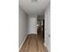 Hallway with wood floors and neutral paint at 222 Alton Cir, Villa Rica, GA 30180