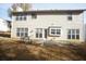Large, flat backyard with a patio and a well-maintained lawn at 3936 Toccoa Falls Dr, Duluth, GA 30097