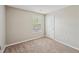 Bedroom with carpet and a window creating a calming space at 3936 Toccoa Falls Dr, Duluth, GA 30097
