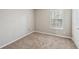 Bedroom with neutral carpet, freshly painted walls and natural light at 3936 Toccoa Falls Dr, Duluth, GA 30097
