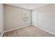 Bedroom featuring neutral walls, plush carpet, and a window with blinds at 3936 Toccoa Falls Dr, Duluth, GA 30097