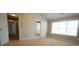 Spacious bedroom featuring large windows offering plenty of natural light and neutral carpeting at 3936 Toccoa Falls Dr, Duluth, GA 30097