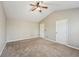 Bedroom featuring a ceiling fan, neutral walls and carpet, offering a clean, versatile space at 3936 Toccoa Falls Dr, Duluth, GA 30097