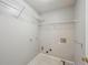 Laundry room area with tile flooring and connections for a washer and dryer at 3936 Toccoa Falls Dr, Duluth, GA 30097