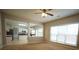Open concept living room flows into the kitchen, featuring large windows at 3936 Toccoa Falls Dr, Duluth, GA 30097