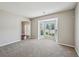 Spacious living room with neutral carpet and a large bay window at 3936 Toccoa Falls Dr, Duluth, GA 30097