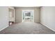 Spacious living room with neutral carpet and large bay window at 3936 Toccoa Falls Dr, Duluth, GA 30097