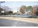 Fenced tennis court area with 'Chattahoochee Reserve' marking visible, well-maintained for sports and recreation at 3936 Toccoa Falls Dr, Duluth, GA 30097