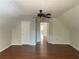 Spacious attic with hardwood floors and an open doorway at 728 Slew Ave, Lawrenceville, GA 30043