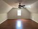 Spacious attic featuring hardwood floors and natural light at 728 Slew Ave, Lawrenceville, GA 30043