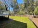 Spacious backyard with deck and wood fence, offering privacy and outdoor space at 728 Slew Ave, Lawrenceville, GA 30043