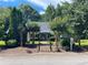 Charming home with a beautifully landscaped front yard and inviting walkway at 728 Slew Ave, Lawrenceville, GA 30043