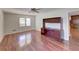 Bright living room with hardwood floors, window views and built in desk at 728 Slew Ave, Lawrenceville, GA 30043