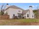 Expansive backyard with a wooden deck and privacy fence, perfect for outdoor entertaining and relaxation at 130 Arbor Cove Way, Stockbridge, GA 30281