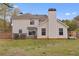 Expansive backyard with a wooden deck and privacy fence, perfect for outdoor entertaining and relaxation at 130 Arbor Cove Way, Stockbridge, GA 30281