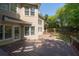 Multi-level backyard deck providing ample outdoor living space and overlooks the landscaped backyard at 3986 Harmony Walk Se Way, Smyrna, GA 30082