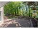 Expansive backyard deck offers great views of the lush landscaping at 3986 Harmony Walk Se Way, Smyrna, GA 30082